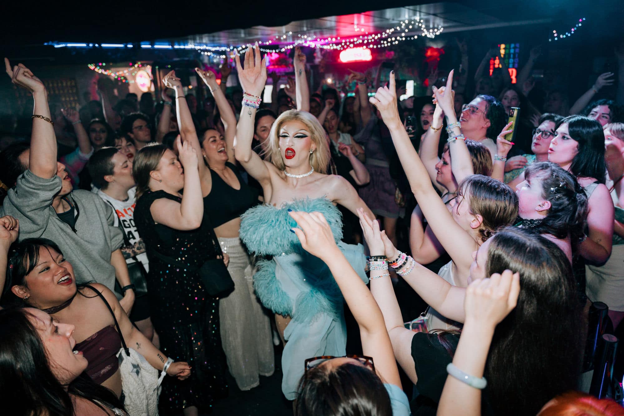 Crowd on the Pride dancefloor mid-show